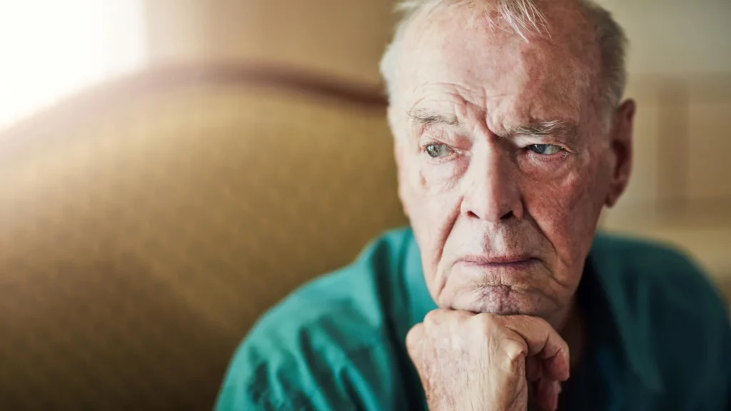 elderly man sad lonely thinking.webp.webp