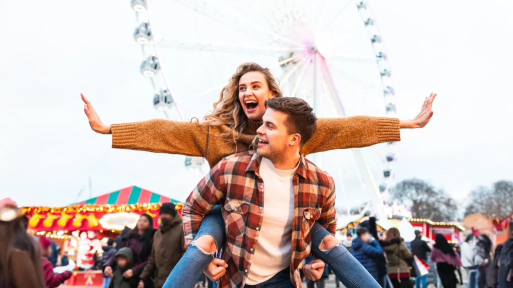 {Couples} who savor glad moments in combination have more potent, longer-lasting relationships happy couple at amusement park.webp.webp