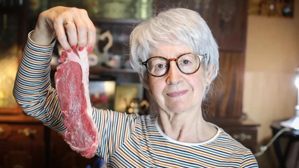 Consuming extra meat would possibly decrease Alzheimer’s chance for some folks Senior Woman Holding Raw Beef Steak.webp 1024x576
