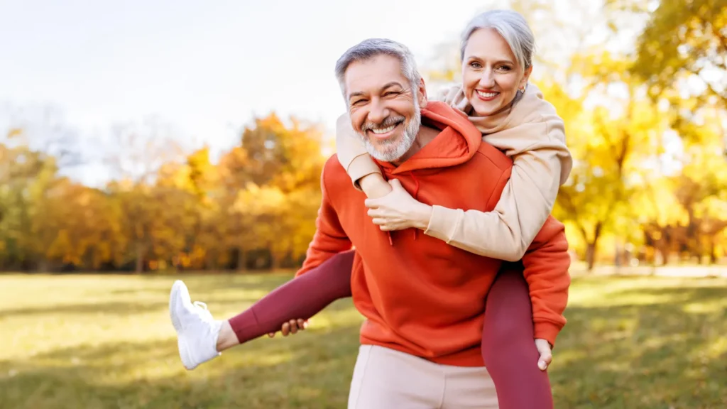 fit happy senior couple city park.webp.webp