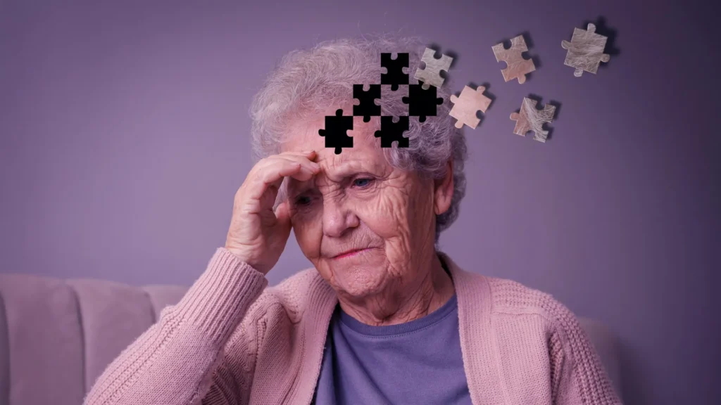 Protein site visitors jams might give an explanation for growing older, reminiscence loss, and Alzheimer’s senior woman aging memory loss dementia brain puzzle pieces.webp.webp